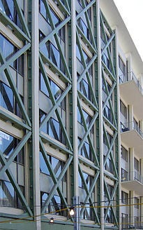 Metal beams across building windows